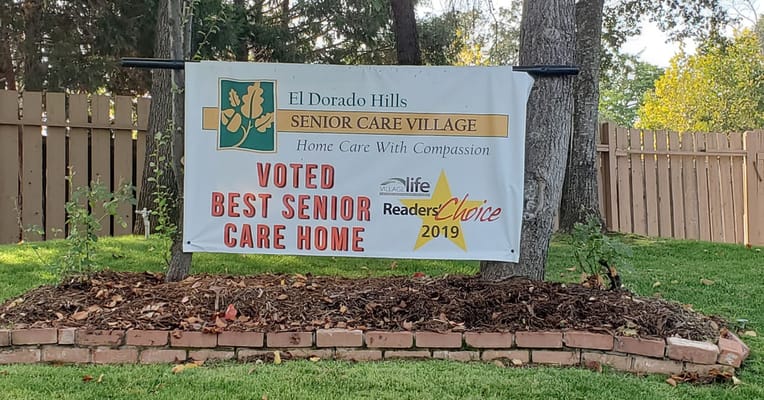 Outdoor banner promoting El Dorado Hills Senior Care Village