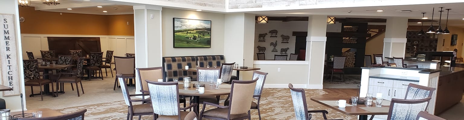 Interior dining area with tables and artwork