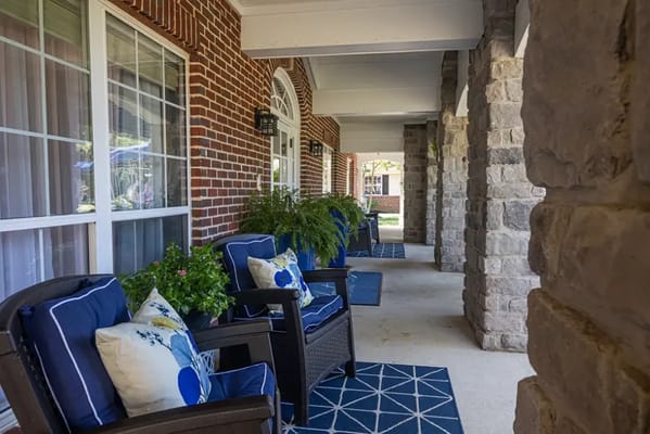 Welcoming sitting area with comfortable chairs and decorative plants