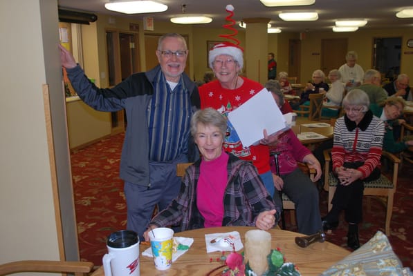 Residents enjoying a festive gathering in a common area