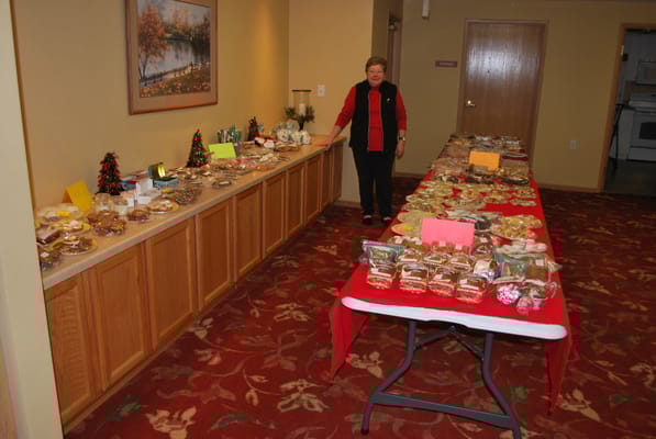 Resident displaying food items for a community event