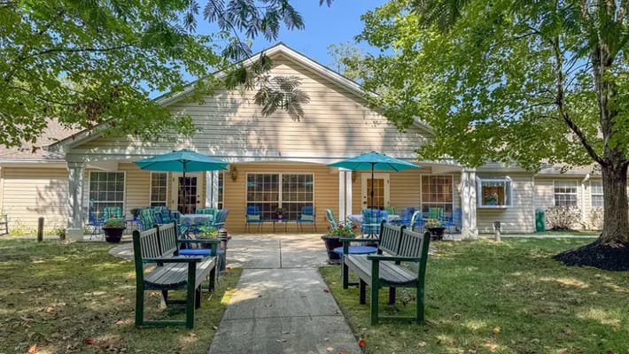 Exterior view of the facility with outdoor seating
