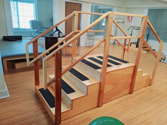Rehabilitation stair equipment in a therapy room