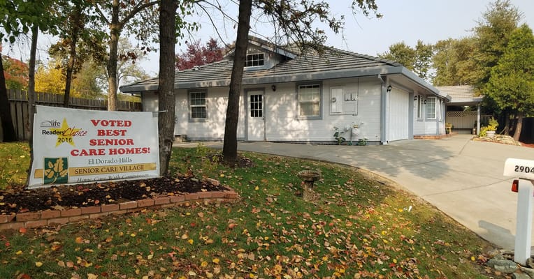 Exterior view of El Dorado Hills Senior Care Village with signage
