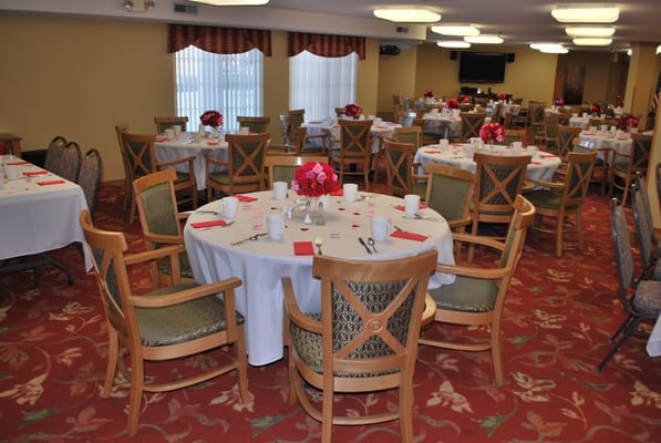 Dining room set for a special occasion with flowers