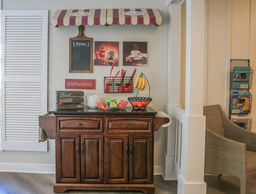 Coffee station in a common area with snacks
