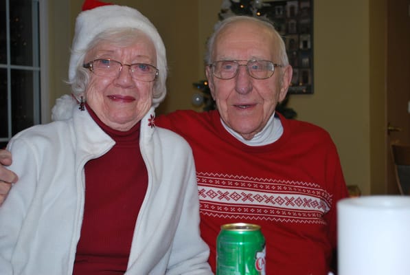 Happy elderly couple celebrating together