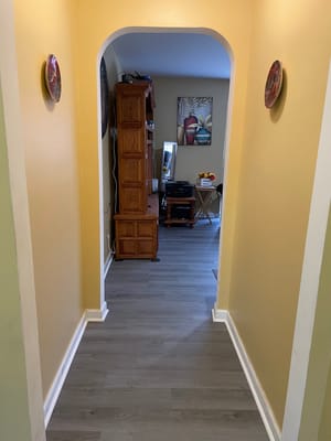 Interior hallway with wooden furniture and decor