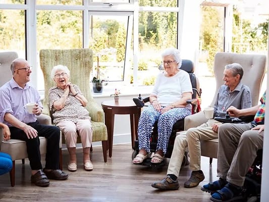 Residents enjoying a social moment in a common area