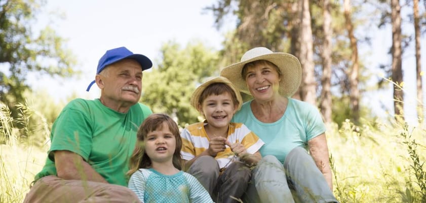 Seniors and children enjoying time together outdoors