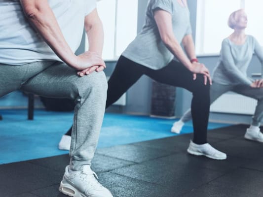 Residents participating in a group exercise activity