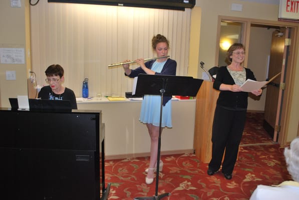 Residents enjoying a musical performance in the facility