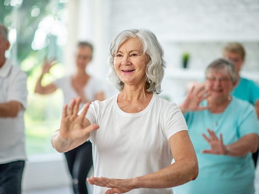 Residents participating in a group exercise class