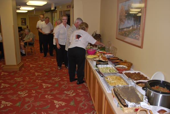 Residents enjoying a meal in the dining area