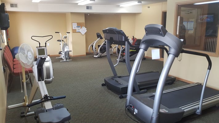 Facility gym with various exercise equipment