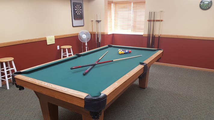 Interior pool table in a game room