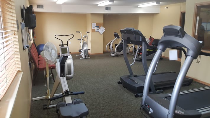 Interior view of a fitness room with equipment