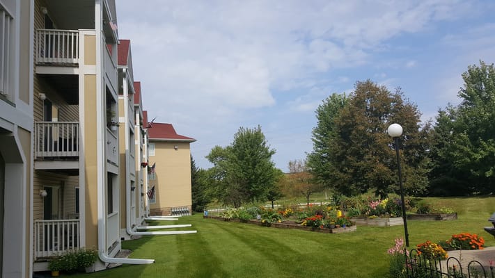 Outdoor view of residential building and flower garden