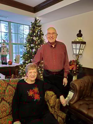 Residents celebrating the holidays in a cozy lounge