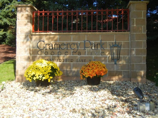 Entrance sign for Gramercy Park Cooperative with flowers