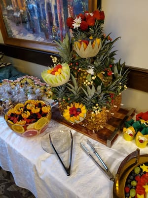 A beautifully arranged fruit display in the dining area