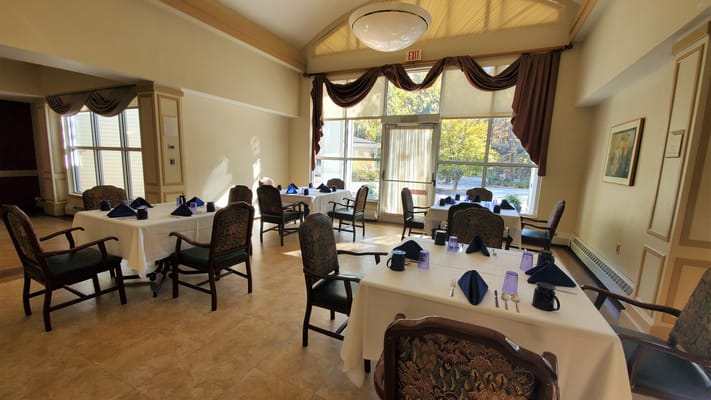Dining area with tables set for a meal