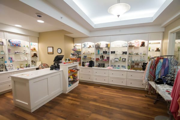 Well-lit reception area with merchandise display