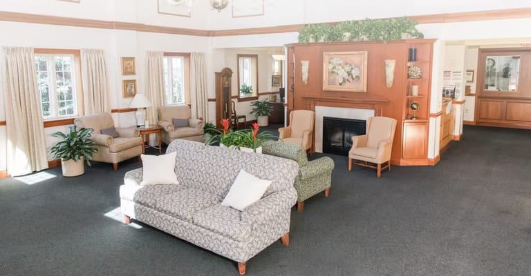 Common area with seating and a fireplace