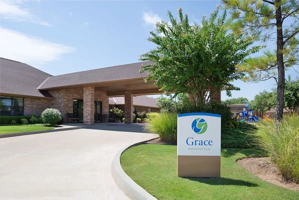 The exterior view of Grace Skilled Nursing facility, featuring landscaping