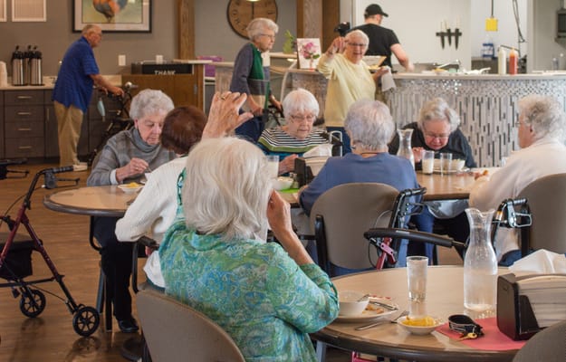 Residents enjoying lunch in the dining room