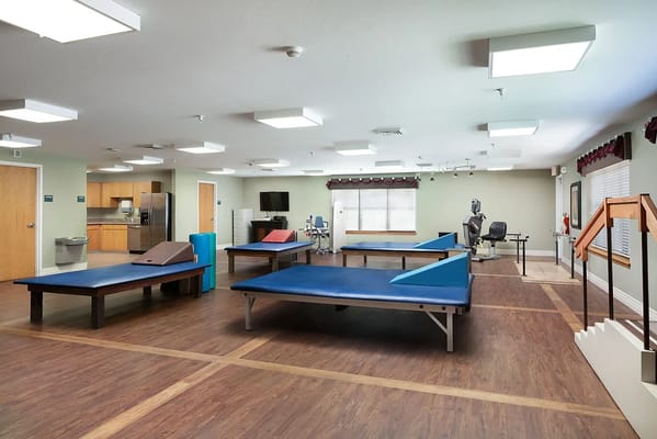 Interior view of a therapy room with equipment