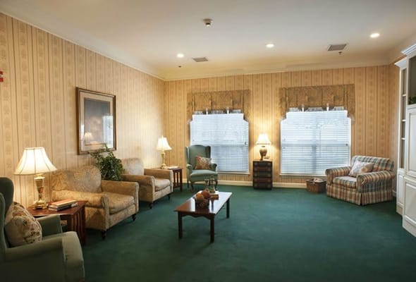 Spacious living room with comfortable seating and natural light