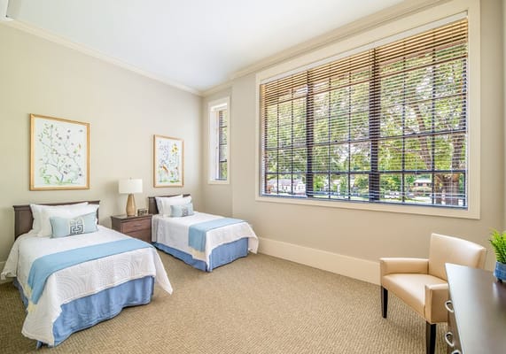 Bright, cozy resident room with two beds