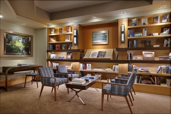 Cozy library area with shelves and seating