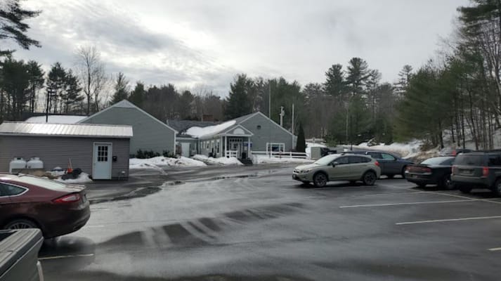 Exterior view of the facility with parking lot