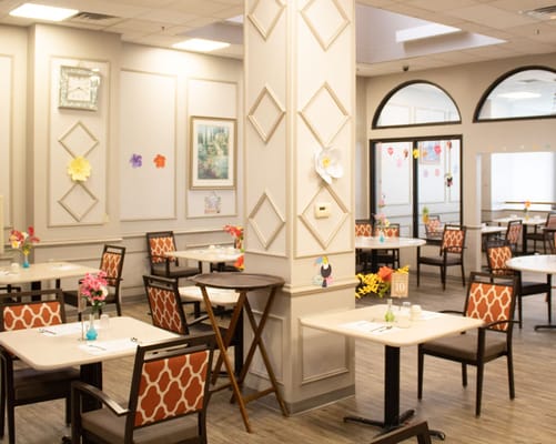 Dining area with decorated tables and chairs