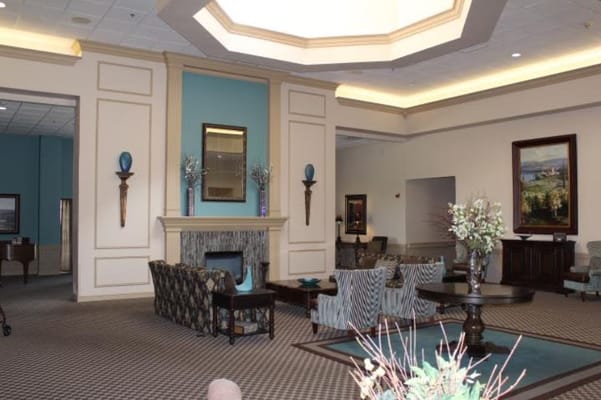 Bright common area with comfortable seating and decor