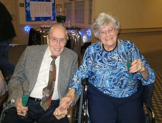 Residents enjoying drinks at a festive gathering