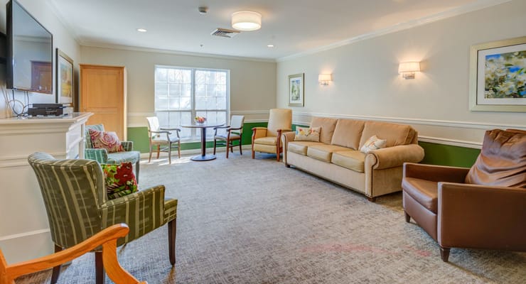 Bright common area with seating and natural light