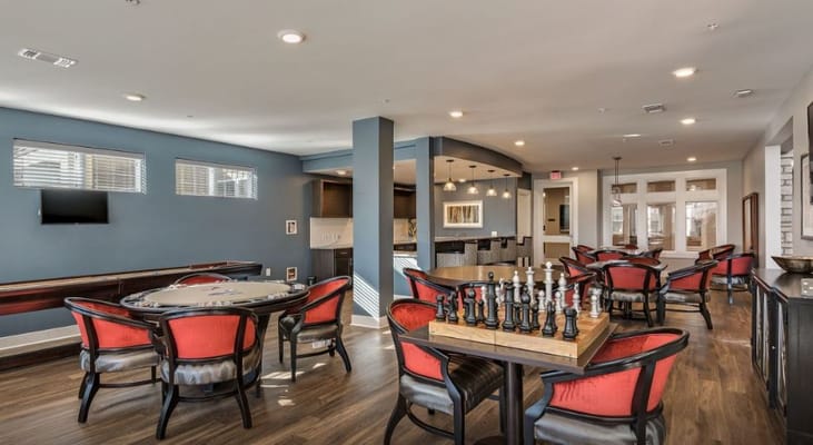 Interior view of a common area with game tables