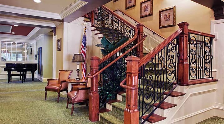 Interior view of a staircase with decorative railing