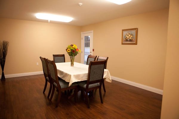 Dining room setup with a table and chairs