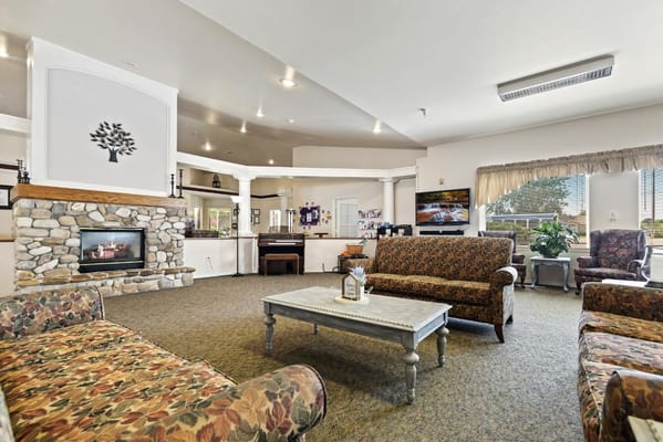 Interior view of a cozy common area with seating