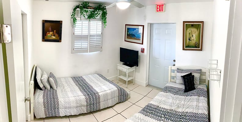 A bright private room with beds and decorations