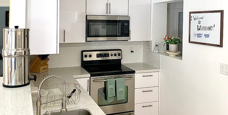 Modern kitchen space with appliances and decor