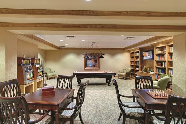 Interior view of the game room featuring pool table and chess set.