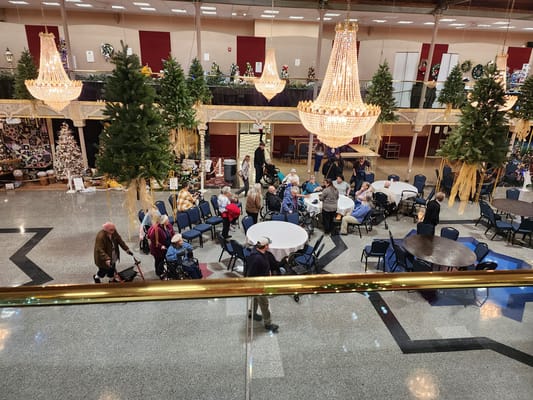 Residents enjoying a social gathering in a large hall