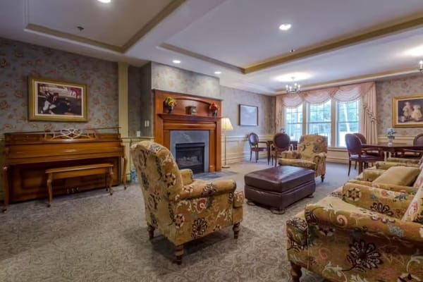 Cozy common area with comfortable seating and a fireplace