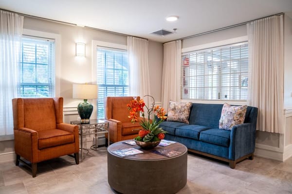 Bright and welcoming interior common area with seating