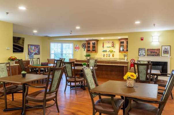 Bright dining area with tables and chairs